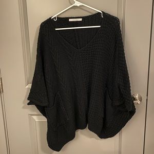 black poncho sweater
